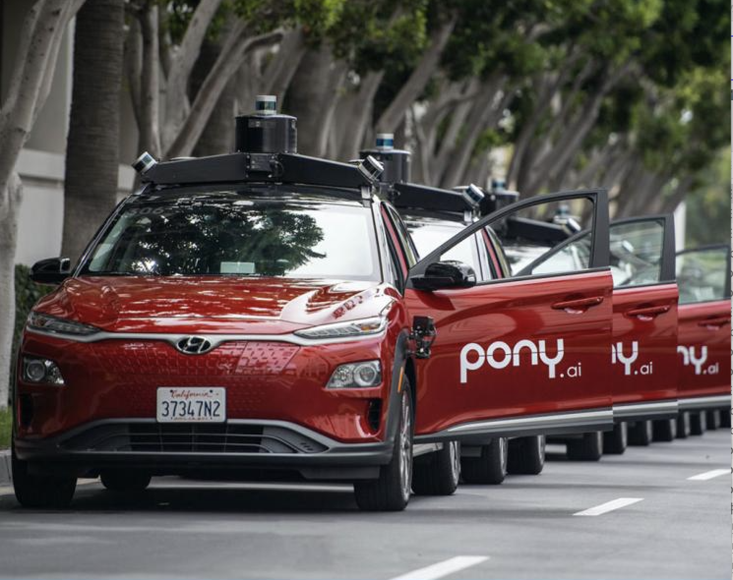 China's Robotaxi Players Expand Globally as Waymo and Tesla Scale Up